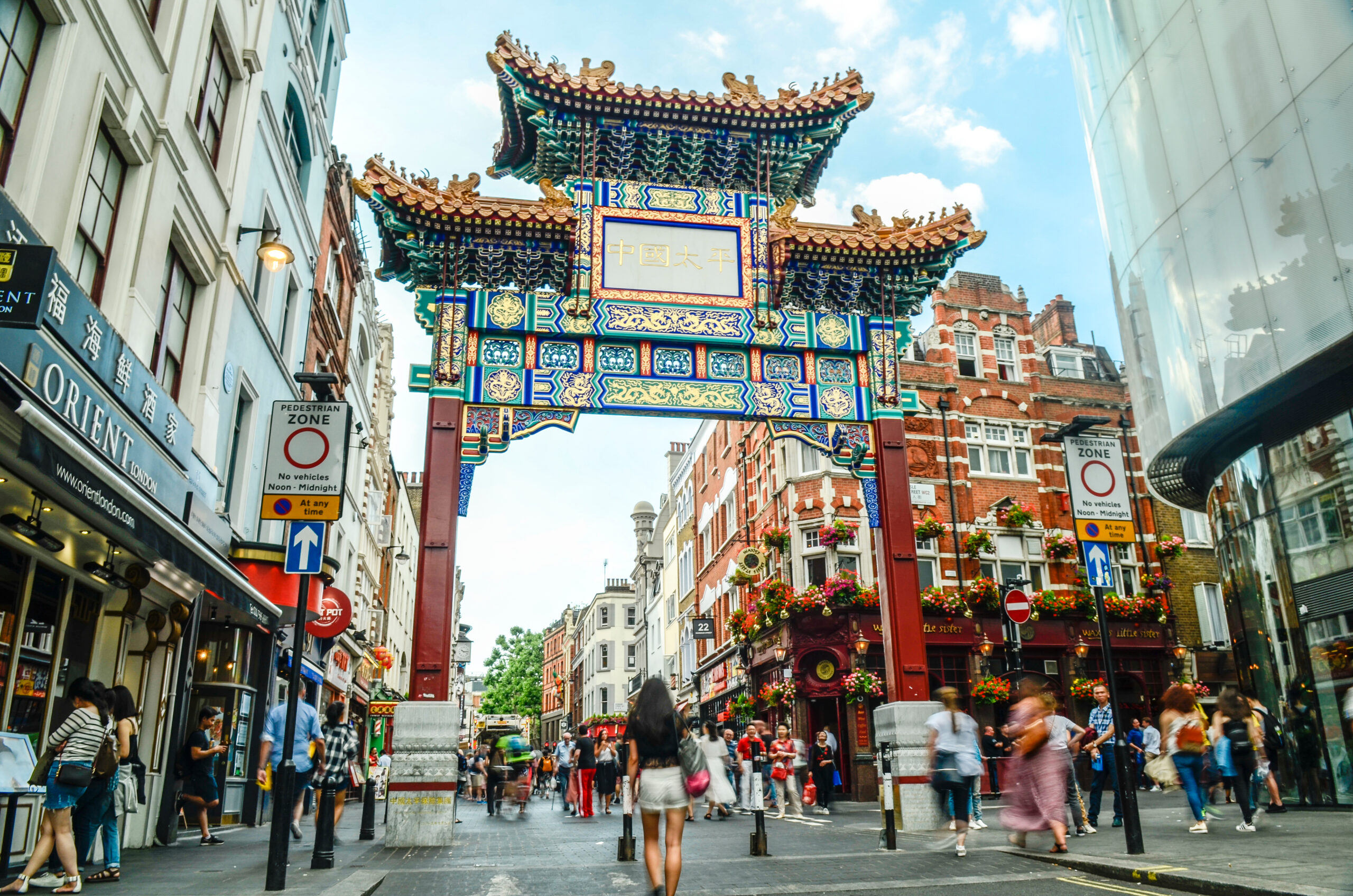 Crowds of people in London's China Town area of Soho in the west end.